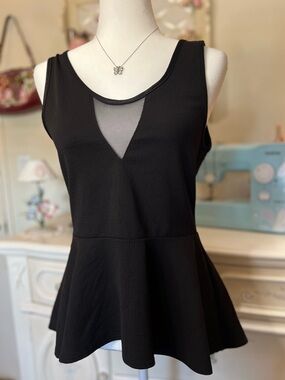 Sleek Black Sleeveless Peplum Tank with Mesh V-Inset